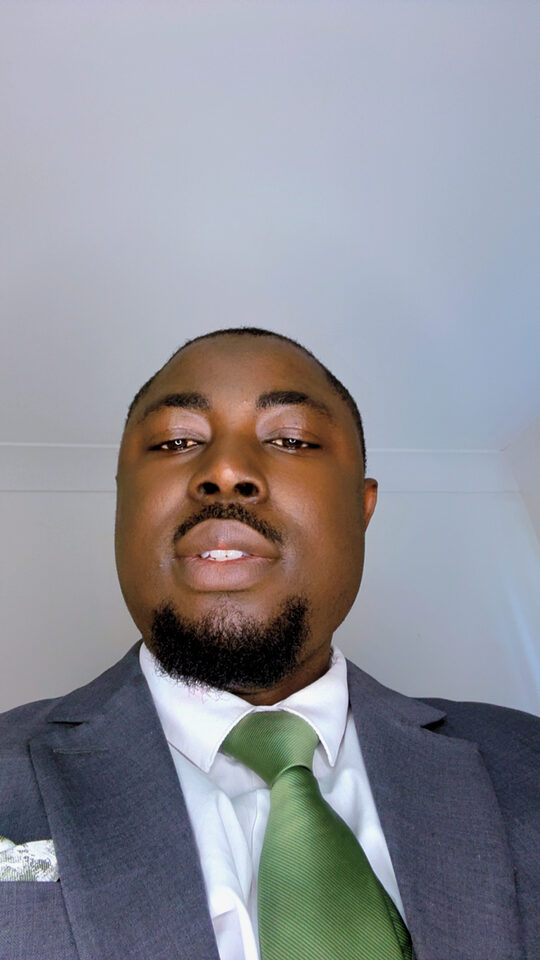 Professional portrait of Nelson Chinedu Odigili